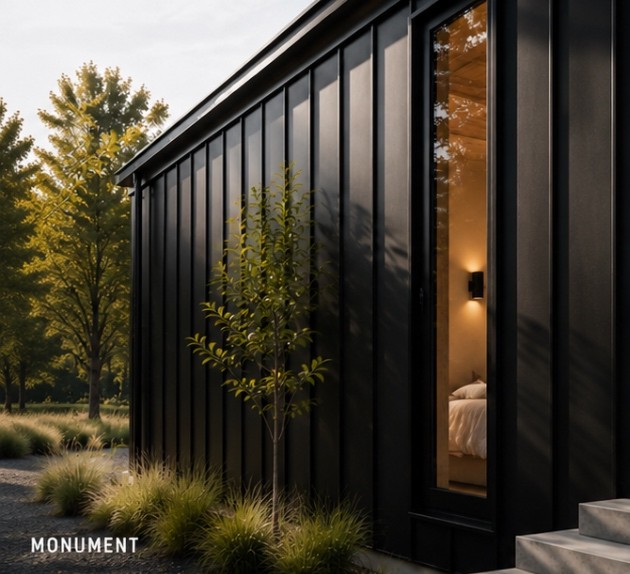 Arc modular exterior corner, fixed camera, clad in the Monument colour.